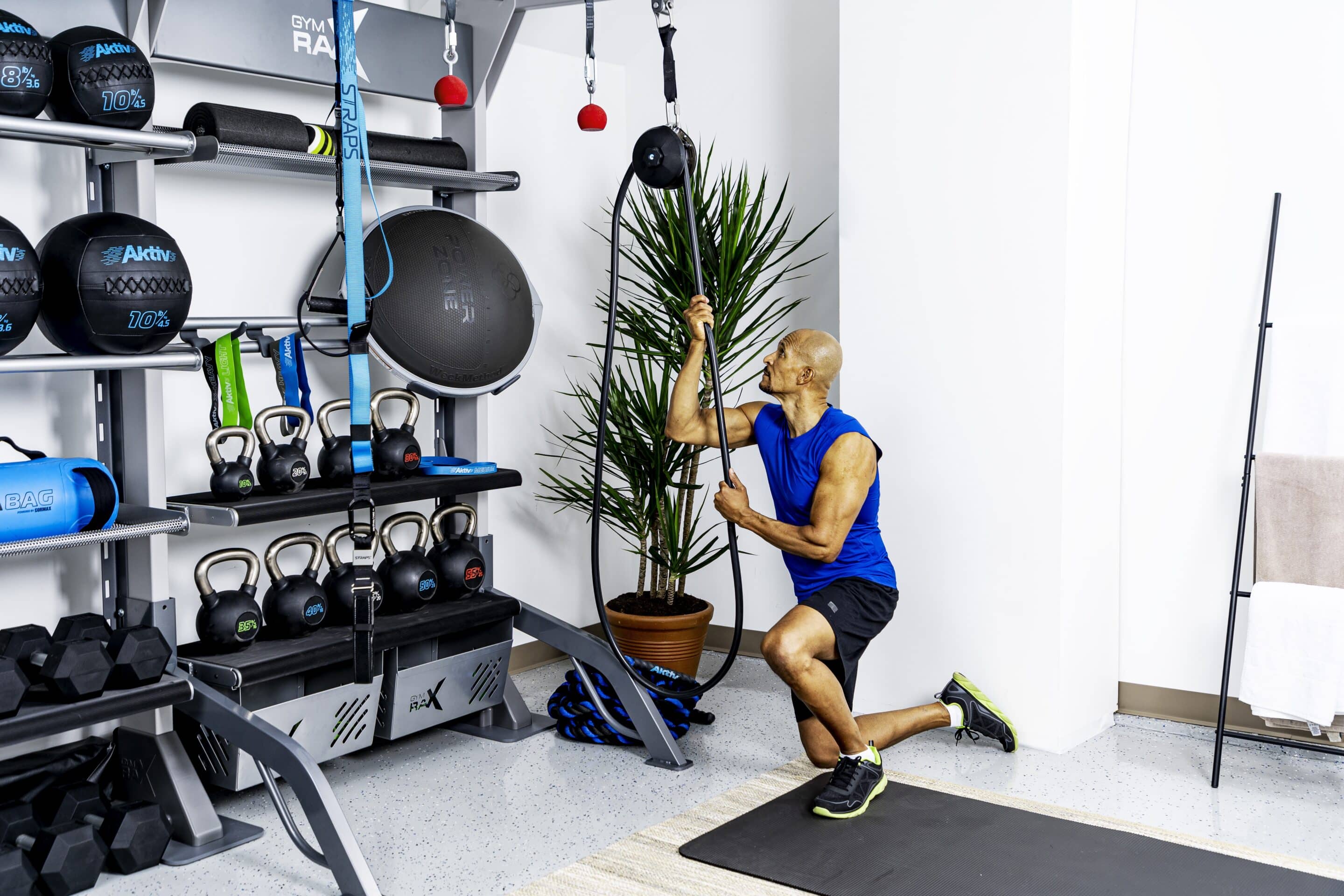 man working out with functional training tools