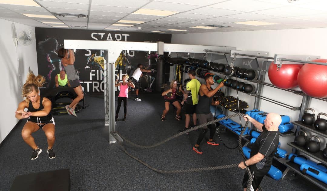 People working out in a community recreation fitness center. 